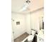 Modern bathroom with updated fixtures, a walk-in shower, and neutral tones at 579 Grimsby Ave, Henderson, NV 89014