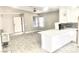 Bright living space with modern floors, large windows, and open access to the kitchen at 579 Grimsby Ave, Henderson, NV 89014