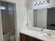 Cozy bathroom with single sink vanity and tub-shower combo at 6462 Saddle Up Ave # 103, Henderson, NV 89011