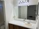 Bright bathroom featuring well-lit vanity and tub-shower combination at 6462 Saddle Up Ave # 103, Henderson, NV 89011