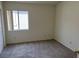 Bedroom with new carpet, neutral paint and plenty of natural light at 6462 Saddle Up Ave # 103, Henderson, NV 89011