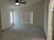 Minimalist bedroom bathed in natural light through a window at 6462 Saddle Up Ave # 103, Henderson, NV 89011