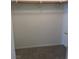 A standard closet with ample space and a hanging rod for clothing at 6462 Saddle Up Ave # 103, Henderson, NV 89011