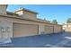 Attached garages offer convenience in this home's exterior featuring ample parking for residents and guests at 6463 Big Pine Way, Las Vegas, NV 89108