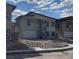 Modern two-story home with a clean design, complemented by a white garage door at 6519 Adrian Ridge Ct, Las Vegas, NV 89149