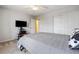 Cozy bedroom with carpet, ceiling fan and a queen size bed at 6783 Pleasant Flower St, Las Vegas, NV 89149