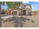 Charming two-story home featuring a two-car garage and low maintenance landscaping at 6783 Pleasant Flower St, Las Vegas, NV 89149