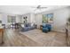 Spacious living room with recessed lighting, tile flooring, and large windows at 6783 Pleasant Flower St, Las Vegas, NV 89149