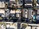 Overhead shot showing homes with well-kept yards, some with pools, in an organized neighborhood layout at 74 Harbor Coast St, Las Vegas, NV 89148