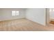 Spacious bedroom featuring neutral walls, soft carpet, and ensuite bathroom at 74 Harbor Coast St, Las Vegas, NV 89148