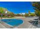 Community featuring well-maintained tennis and basketball courts under a sunny sky at 74 Harbor Coast St, Las Vegas, NV 89148