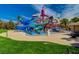 Fun community water park featuring colorful slides, shallow pools, and shaded seating areas at 74 Harbor Coast St, Las Vegas, NV 89148