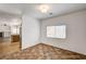 Dining area with view of open kitchen and fireplace. Natural light at 74 Harbor Coast St, Las Vegas, NV 89148