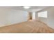 Spacious carpeted living area perfect for entertaining or relaxing at 74 Harbor Coast St, Las Vegas, NV 89148