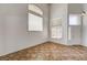 Bright and airy living room with high ceilings and large windows for plenty of natural light at 74 Harbor Coast St, Las Vegas, NV 89148
