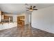 Open floor plan with kitchen in background. Large windows for natural light at 74 Harbor Coast St, Las Vegas, NV 89148