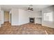 Spacious living room with fireplace and ceiling fan. Open floor plan at 74 Harbor Coast St, Las Vegas, NV 89148