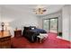 Bright bedroom with a ceiling fan and patio access at 7461 Tahoe Basin Dr, Las Vegas, NV 89129