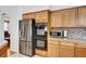 Kitchen featuring modern appliances and granite countertops at 7461 Tahoe Basin Dr, Las Vegas, NV 89129