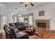 Spacious living room with fireplace, wood floors, and natural light at 7461 Tahoe Basin Dr, Las Vegas, NV 89129