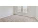 Bedroom with two windows providing natural light at 7813 Paper Flower Ct, Las Vegas, NV 89128
