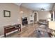 Spacious living area featuring wood floors, neutral tones, and a comfortable seating arrangement at 8109 Sunset Mill Dr, Las Vegas, NV 89128