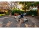 Zen backyard with multiple seating areas provides the perfect setting for outdoor relaxation at 8365 S Hauck St, Las Vegas, NV 89139