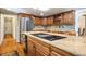 Spacious kitchen features an island with granite countertops and stainless steel appliances at 8365 S Hauck St, Las Vegas, NV 89139