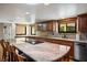 Open concept kitchen with granite countertops and center island with seating at 8365 S Hauck St, Las Vegas, NV 89139