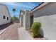 Side view of the front of the home, showing the front door and drought-resistant landscaping at 887 Cozy Valley St, Henderson, NV 89015
