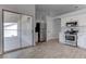 Modern kitchen boasts stainless appliances and seamless access to the outdoor patio at 887 Cozy Valley St, Henderson, NV 89015
