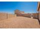 Expansive backyard area with gravel and block wall surround at 909 Trinity Pond Cir, Henderson, NV 89002