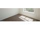 Cozy bedroom with carpet and a window providing natural light at 909 Trinity Pond Cir, Henderson, NV 89002