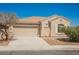 Charming single-story home with a well-maintained front yard and two car garage at 909 Trinity Pond Cir, Henderson, NV 89002