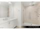 Modern bathroom with glass shower, sleek vanity, and elegant finishes for a luxurious feel at 9101 Alta Dr # 102, Las Vegas, NV 89145