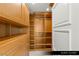Spacious walk-in closet with custom built-ins providing ample storage and organization solutions at 9101 Alta Dr # 102, Las Vegas, NV 89145