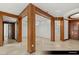 Open-concept dining room with wood trim and views into primary bedroom, office, and dining area at 9101 Alta Dr # 102, Las Vegas, NV 89145