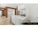 Open-concept kitchen and dining area featuring a Thermador appliance package at 9101 Alta Dr # 102, Las Vegas, NV 89145