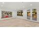 Inviting living area featuring travertine floors, and natural light creating a serene atmosphere at 9101 Alta Dr # 102, Las Vegas, NV 89145