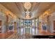 An opulent lobby featuring marble flooring, elegant decor, and striking chandeliers at 9101 Alta Dr # 102, Las Vegas, NV 89145