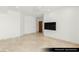 The main bedroom has neutral paint and tile, natural light, and a TV at 9101 Alta Dr # 102, Las Vegas, NV 89145