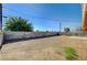 Large backyard area with block wall, providing ample space for outdoor activities at 929 Center St, Henderson, NV 89015