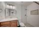Modern bathroom with vanity, updated fixtures, shower, and mosaic tile accents at 929 Center St, Henderson, NV 89015