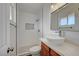 Updated bathroom with sleek fixtures, stylish vanity, and a tiled walk-in shower at 929 Center St, Henderson, NV 89015