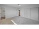 Neutral bedroom boasts ample closet space and an ensuite bathroom for privacy at 929 Center St, Henderson, NV 89015