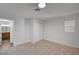 Bedroom features neutral carpet, white walls, and a closet with sliding doors at 929 Center St, Henderson, NV 89015