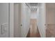 Hallway with wood flooring and closet with bi-fold doors at 929 Center St, Henderson, NV 89015
