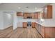 Modern kitchen with stainless steel appliances, granite countertops, and ample cabinet space at 929 Center St, Henderson, NV 89015