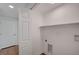Functional laundry room includes ample space for appliances, plus shelving at 929 Center St, Henderson, NV 89015