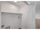 Functional laundry room with shelving and utility connections, offering practicality and convenience at 929 Center St, Henderson, NV 89015